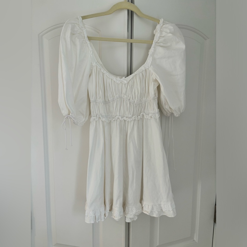 For love and lemons mini white dress.